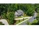 Aerial shot of the residence highlighting the lush greenery and serene neighborhood at 313 Anderwood Rdg, Marietta, GA 30064