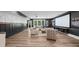 Finished basement living area featuring comfortable seating, a projector screen, and custom wall trim at 313 Anderwood Rdg, Marietta, GA 30064