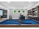 Finished basement featuring a pool table, bar, and media area with large projector screen at 313 Anderwood Rdg, Marietta, GA 30064