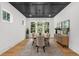 A bright dining room boasts natural light and stylish decor at 313 Anderwood Rdg, Marietta, GA 30064