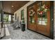 Inviting front porch with comfortable seating, and double front doors adorned with seasonal wreaths at 313 Anderwood Rdg, Marietta, GA 30064