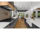 Modern kitchen featuring stainless steel appliances, a large center island, and custom cabinetry at 313 Anderwood Rdg, Marietta, GA 30064