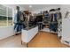 A large walk-in closet offers custom shelving, shoe storage, and plenty of hanging space at 313 Anderwood Rdg, Marietta, GA 30064