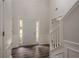 Grand entryway featuring hardwood floors, a staircase, and views of the front door at 4959 Abbotts Glen, Acworth, GA 30101