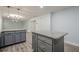 Spacious kitchen with gray cabinets, granite counters, and modern pendant lighting at 4959 Abbotts Glen, Acworth, GA 30101