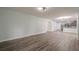 Expansive living area with wood floors, recessed lights, and open flow to the kitchen for entertaining at 4959 Abbotts Glen, Acworth, GA 30101