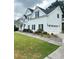 Charming two-story home featuring an attached garage and well-maintained lawn and landscaping at 540 Langley Creek Dr, Loganville, GA 30052