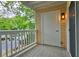 Outdoor balcony featuring wood-style floor and white railings perfect for relaxing and taking in the surrounding view at 1202 Countryside Pl, Smyrna, GA 30080
