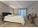 Comfortable bedroom with neutral walls, plush carpet, and a balcony door at 1202 Countryside Pl, Smyrna, GA 30080