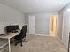 Spacious bedroom featuring carpet, computer setup, and neutral walls at 1202 Countryside Pl, Smyrna, GA 30080