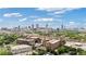 Aerial view of the community surrounded by trees, railway, and a beautiful view of the city skyline at 170 Boulevard Se # E120, Atlanta, GA 30312