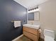 Chic bathroom featuring modern vanity, sleek gold fixtures, and contrasting wall colors at 170 Boulevard Se # E120, Atlanta, GA 30312