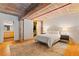 Comfortable bedroom with wooden floors, exposed beams, and a modern style at 170 Boulevard Se # E120, Atlanta, GA 30312