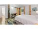 Bright bedroom featuring a sliding barn door, wooden pillars, and modern decor at 170 Boulevard Se # E120, Atlanta, GA 30312