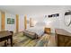 Spacious bedroom with a neutral color palette, wooden pillars, and a comfortable bed at 170 Boulevard Se # E120, Atlanta, GA 30312