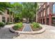 Beautifully landscaped courtyard with mature trees and central gathering space at 170 Boulevard Se # E120, Atlanta, GA 30312