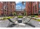 Community courtyard with outdoor fireplace and comfortable seating at 170 Boulevard Se # E120, Atlanta, GA 30312