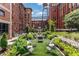 Landscaped courtyard with synthetic lawn and seating areas at 170 Boulevard Se # E120, Atlanta, GA 30312