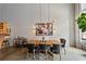 Bright dining room with view into the open living room and kitchen at 170 Boulevard Se # E120, Atlanta, GA 30312