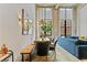 Bright dining room with view into the open living room with large windows at 170 Boulevard Se # E120, Atlanta, GA 30312