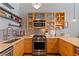 Well-equipped kitchen with modern appliances and open shelving at 170 Boulevard Se # E120, Atlanta, GA 30312