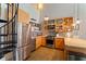 Bright kitchen featuring stainless steel appliances, modern cabinets, and a convenient spiral staircase at 170 Boulevard Se # E120, Atlanta, GA 30312