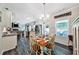 Bright dining area offering a seamless transition from the kitchen and living room at 93 Oakdale Way, Temple, GA 30179