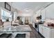 Modern kitchen featuring granite countertops, stainless steel appliances, and ample cabinet space at 93 Oakdale Way, Temple, GA 30179