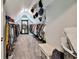 Large walk-in closet with ample storage, carpet floors, shelving, and a mirror for dressing at 93 Oakdale Way, Temple, GA 30179