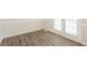 Elegant dining area with wood floors and access to the backyard at 4100 Summer Wood Dr, Snellville, GA 30039