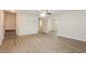 Bright living area featuring wood floors, a built-in bookcase, and an open layout at 4100 Summer Wood Dr, Snellville, GA 30039