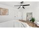 Modern bedroom featuring ceiling fan, wood floors and white paint is move in ready at 1349 Lockhaven Sw Cir, Atlanta, GA 30311