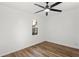 Bright and airy bedroom with ceiling fan, wood floors, and neutral paint at 1349 Lockhaven Sw Cir, Atlanta, GA 30311