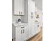 Elegant butler's pantry with white cabinets and countertops offers ample storage at 1349 Lockhaven Sw Cir, Atlanta, GA 30311
