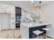 Bright kitchen with a breakfast bar, modern appliances, and stylish pendant lighting at 1349 Lockhaven Sw Cir, Atlanta, GA 30311