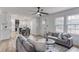 Open-concept living area with a modern kitchen, dining table, and comfortable seating at 1349 Lockhaven Sw Cir, Atlanta, GA 30311