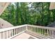 Balcony overlooking mature trees and foliage on a sunny day at 220 Mars Hill Rd, Powder Springs, GA 30127