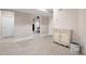 Finished basement with tile floors and a decorative cabinet at 220 Mars Hill Rd, Powder Springs, GA 30127
