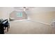 Large bonus room with plush carpet flooring, large window, ceiling fan, and endless possibilities at 220 Mars Hill Rd, Powder Springs, GA 30127