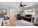 Bright living room with neutral paint, hardwood floors, and comfortable seating at 220 Mars Hill Rd, Powder Springs, GA 30127