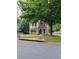 Charming two-story home with well-manicured lawn and attached garage at 5030 N Bridges Dr, Alpharetta, GA 30022