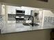 Kitchen featuring granite countertops and stainless steel appliances at 5030 N Bridges Dr, Alpharetta, GA 30022