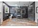 This bathroom features a walk-in shower with decorative floor and dark wall tiling at 555 Valley Hall Dr, Atlanta, GA 30350