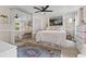 Bright bedroom with mirrored closet doors, a ceiling fan, and stylish decor at 555 Valley Hall Dr, Atlanta, GA 30350