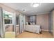 Cozy bedroom with ample natural light and minimalist decor at 555 Valley Hall Dr, Atlanta, GA 30350