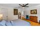 Cozy bedroom with wood floors, windows with lots of light, and ceiling fan at 555 Valley Hall Dr, Atlanta, GA 30350