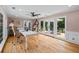 Bright home office with hardwood floors, large windows, and a deck providing an ideal work-from-home environment at 555 Valley Hall Dr, Atlanta, GA 30350