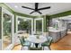 Cozy breakfast nook with backyard view next to a gourmet kitchen with marble countertops at 555 Valley Hall Dr, Atlanta, GA 30350