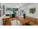 Bright kitchenette and dining area featuring stainless steel appliances and a cozy seating nook at 555 Valley Hall Dr, Atlanta, GA 30350