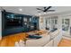 Comfortable living room with a white couch, hardwood floors, and a modern navy media center at 555 Valley Hall Dr, Atlanta, GA 30350